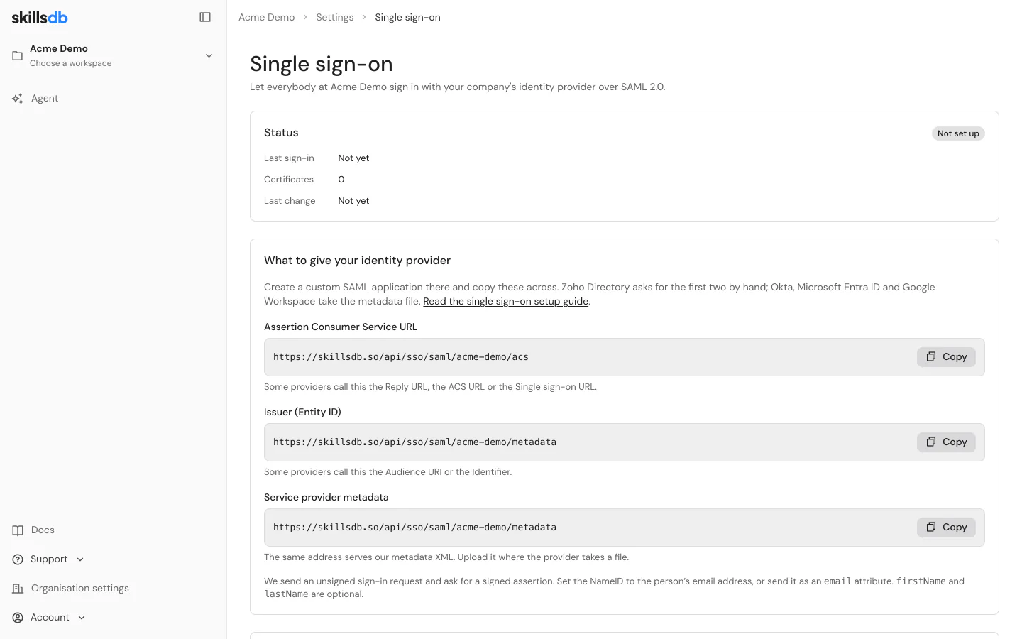 The Single sign-on page in SkillsDB organisation settings, showing the Status card and the Assertion Consumer Service URL, the Issuer and the service provider metadata address, each with a Copy button